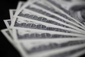 Dollar retreats from two-week high ahead of Fed decision