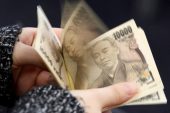 Analysis-Bank of Japan's opaque policy shift means stronger, wilder yen