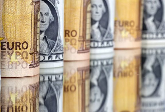 Dollar hovers around 2-month high, Norwegian crown rises