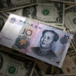 Exclusive-China's state banks seen selling dollars for yuan in London and New York hours