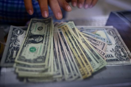 Dollar up after inflation data boost