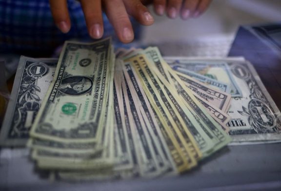 Dollar up after inflation data boost