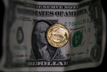 Dollar edges up from three-month low, French inflation data dents euro