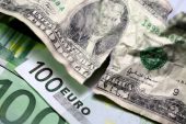 Dollar dips ahead of payrolls; euro gains on French poll results