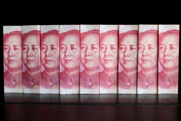 China's yuan down on first trading day of 2024, policy easing eyed