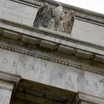 Analysis-Fed pivot may cap junk bond defaults, but risks remain