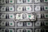 Dollar clings to previous day's gains as focus turns to U.S. data