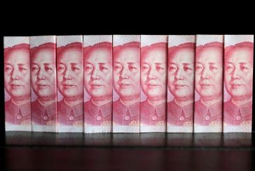 China's yuan eases against the dollar on widening yield differential