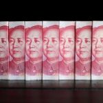 Exclusive-China's state banks act to stem yuan slide onshore and offshore -sources