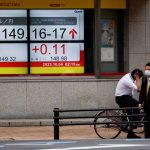 Japan stocks hit 34-year high, global markets calm before US inflation