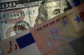 Dollar edges lower, euro gains ahead of key inflation readings