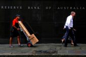 Australia's RBA holds rates as inflation cools, warns hike still an option
