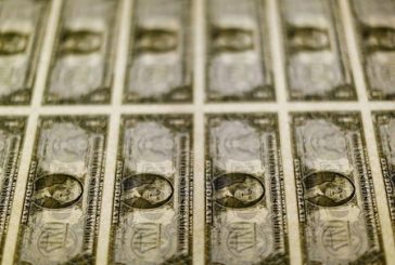 Dollar holds steady as markets eye U.S. inflation test later in the week