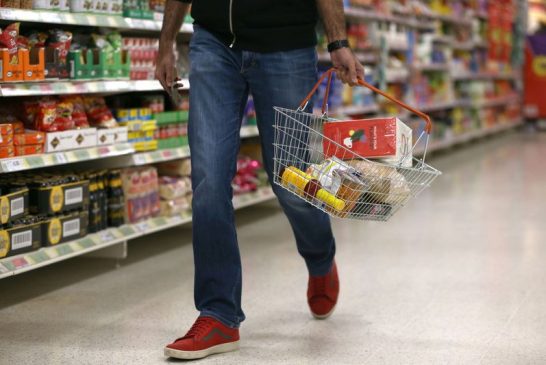 UK shoppers pick up their spending, signalling quick end to recession