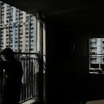 Hong Kong under pressure to ease property curbs, plug deficit in budget