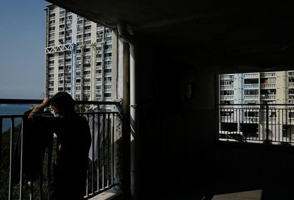 Hong Kong under pressure to ease property curbs, plug deficit in budget