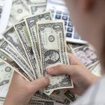 Dollar ends week under pressure as data keeps rate cut hopes alive