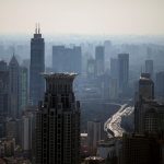 Fitch cuts China's ratings outlook on growth risks
