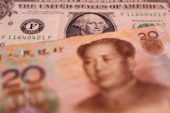 Analysis-China's cycle of dollar hoarding and weakening yuan gets vicious