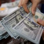 Dollar slips ahead of GDP data; euro rises and yen surges