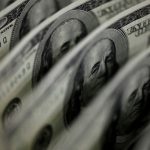 Dollar firm ahead of global inflation data