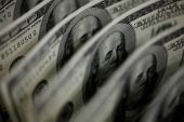 Dollar firm ahead of global inflation data