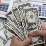 Dollar set for first monthly drop after US inflation readout