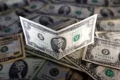 Dollar steadies ahead of payrolls; German retail sales rise