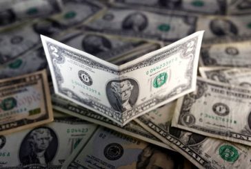 Dollar edges higher; inflation data and political debate loom
