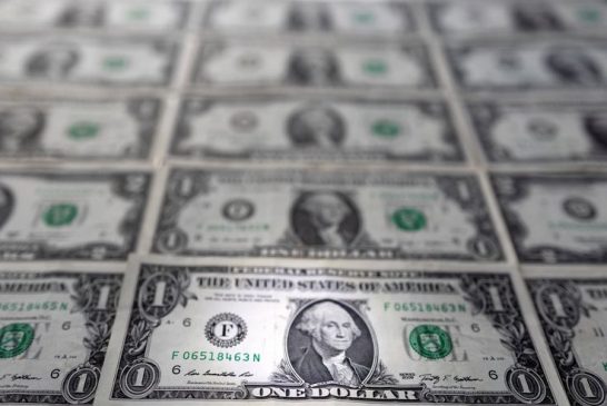 Dollar pares losses as Fed officials project only one rate cut this year