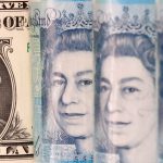 Sterling ekes out gain as investors look beyond soft growth figures