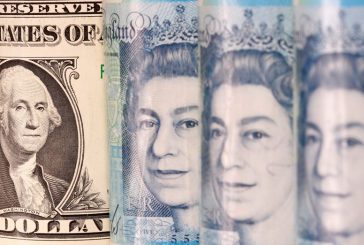 Sterling ekes out gain as investors look beyond soft growth figures