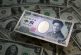 Dollar gains after rates-driven yoyo; yen fragile ahead of BOJ
