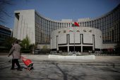 Institutions snapping up Chinese treasury bonds are shorting the economy, state media says