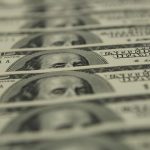 Dollar hands back some gains; Jackson Hole looms large