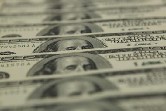 Dollar hands back some gains; Jackson Hole looms large