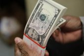 Dollar set for losing week; sterling falls further after retail sales