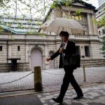 BOJ deputy governor plays down chance of near-term rate hike, yen slumps