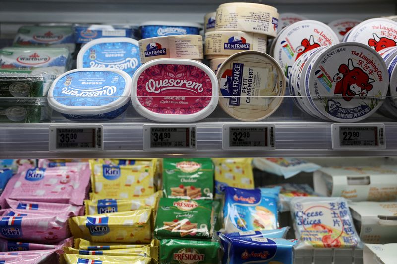 © Reuters. FILE PHOTO: Cheese products displayed at the dairy section of a supermarket in Beijing, China June 13, 2024. REUTERS/Florence Lo/File Photo