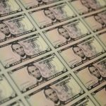 Dollar stabilizes after sharp rebound; Fed officials in focus