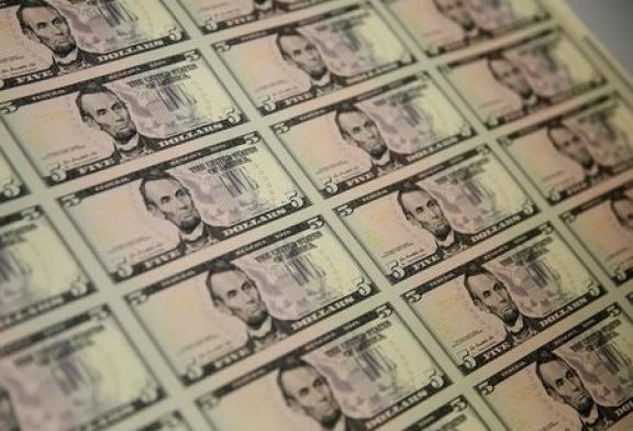 Dollar stabilizes after sharp rebound; Fed officials in focus