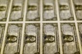 Dollar eases after hitting highest in almost two weeks, US job data looms