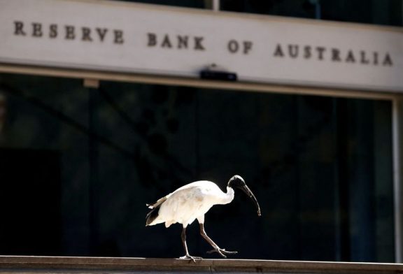 Australia's central bank holds rates, softens hawkish stance slightly