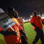 White House sides with union as dockworker strike enters second day