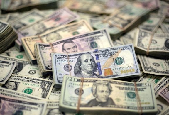 Dollar eases from 7-week highs as traders weigh Fed rate path