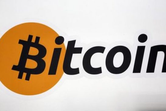 Cryptocurrency-Related Stocks Fall as Bitcoin Drops to $66,000