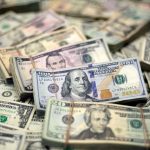 Dollar ticks lower as US election, likely Fed rate cut loom