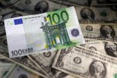 Why is the euro falling and could it hit $1?