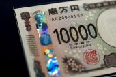 Dollar rises vs yen on BOJ caution, while euro sell-off pauses