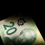 CANADA FX DEBT – Canadian dollar strengthens, benchmark yield slips